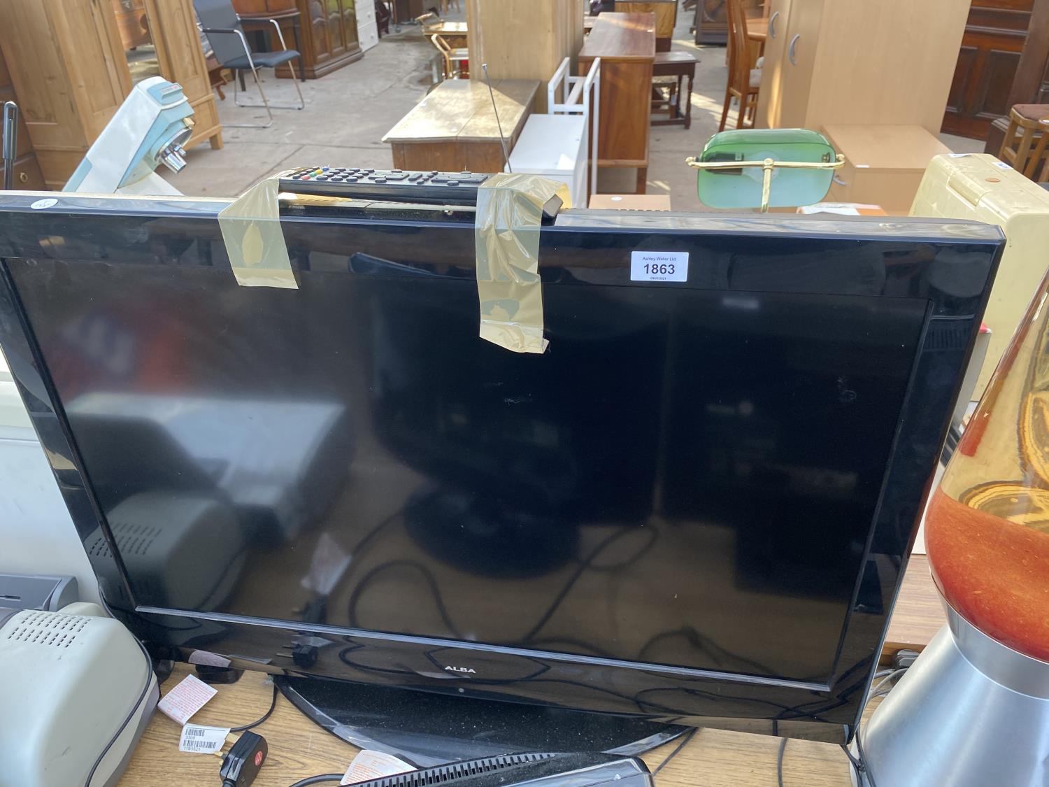 AN ALBA 32" TELEVISION BELIEVED IN WORKING ORDER BUT NO WARRANTY