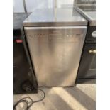 A SILVER SMEG SLIMLINE DISHWASHER BELIEVED IN WORKING ORDER BUT NO WARRANTY