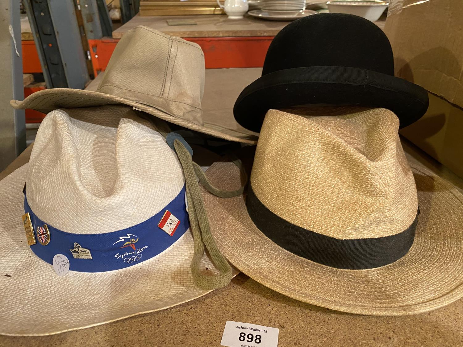 FOUR VARIOUS GENTLEMEN'S HATS TO INCLUDE A BOWLER AND A PANAMA DATING FROM THE SYDNEY OLYMPIC
