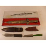A BOXED KNIFE, 21CM BLADE AND TWO THROWING KNIVES, BLADES 10CM AND 11CM (3)