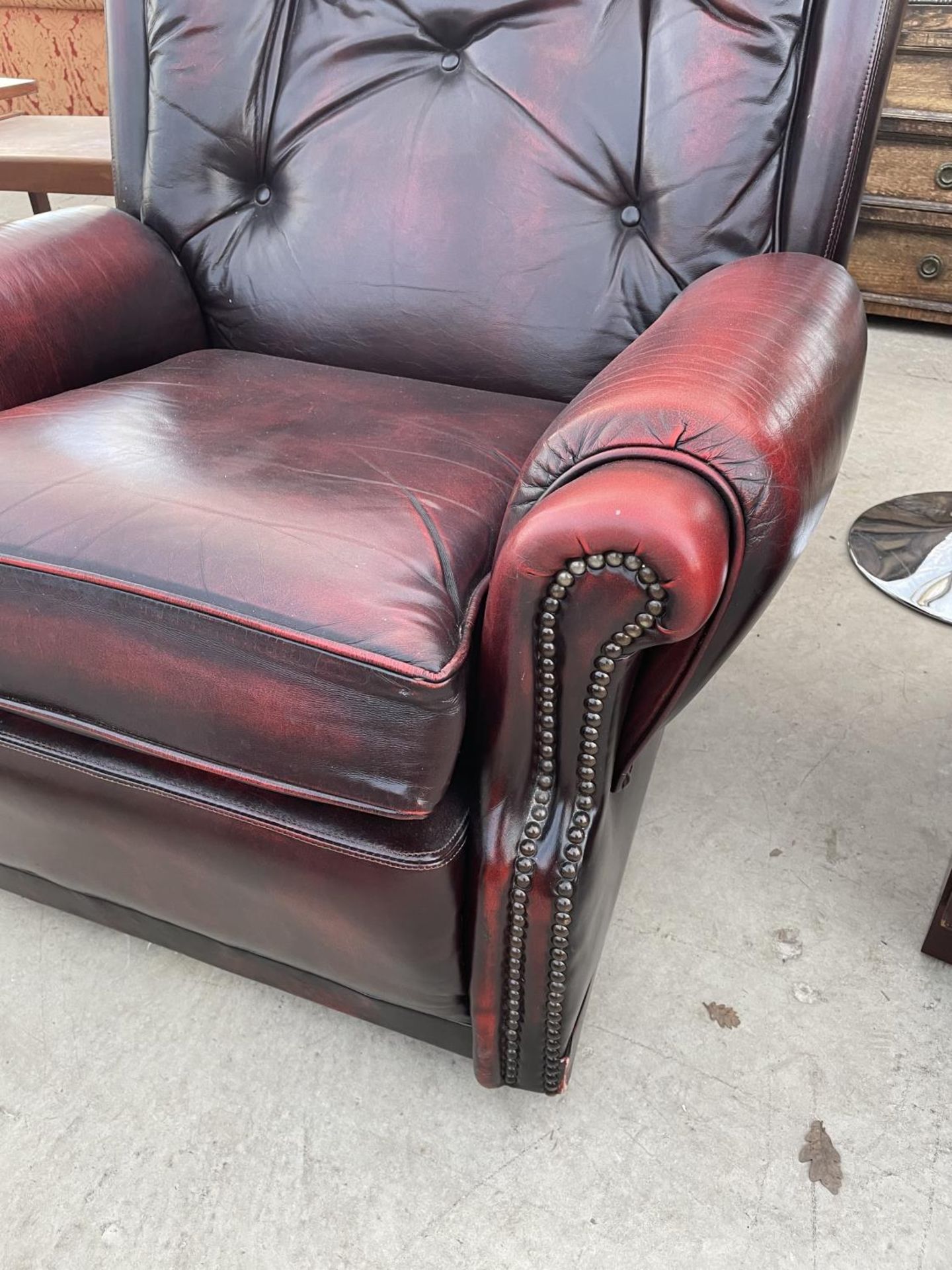 AN OX BLOOD 'CENTURION FURNITURE' EASY CHAIR - Image 2 of 4