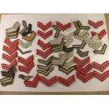 A LARGE COLLECTION OF LANCE CORPORAL, CORPORAL AND SARGENTS STRIPES