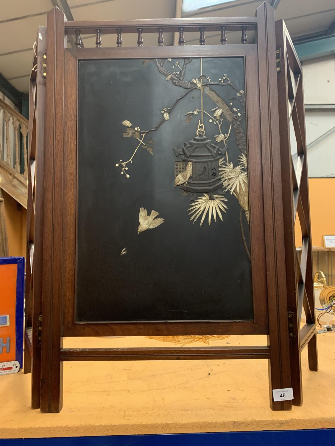 A CHINESE EBONISED SHINWARA SCREEN WITH MOTHER OF PEARL DECORATION