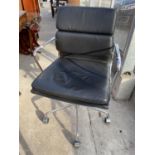 AN EAMES SWIVEL OFFICE CHAIR ON CHROMIUM PLATED FRAME