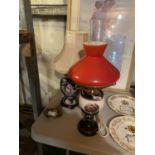 TWO DECORATIVE CERAMIC TABLE LAMPS ONE AN OIL EXAMPLE CONVERTED TO ELECTRIC
