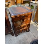 A MAHOGANY TWO DRAWER FILING CABINET WITH INSET LEATHER TOP, 21" WIDE