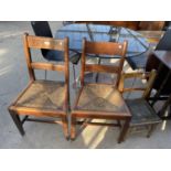 A PAIRY OF RUSH SEATED COUNTRY CHAIRS AND SMALL 1950'S CHILDS CHAIR
