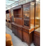 A REPRODUCTION MAHOGANY AND INLAID BREAKFRONT BOOKCASE WITH TWO ASTRAGAL GLAZED DOORS, CENTRE