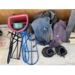 A LARGE QUANTITY OF HORSE TACK TO INCLUDE RUGS, HAY NETS AND FEEDERS