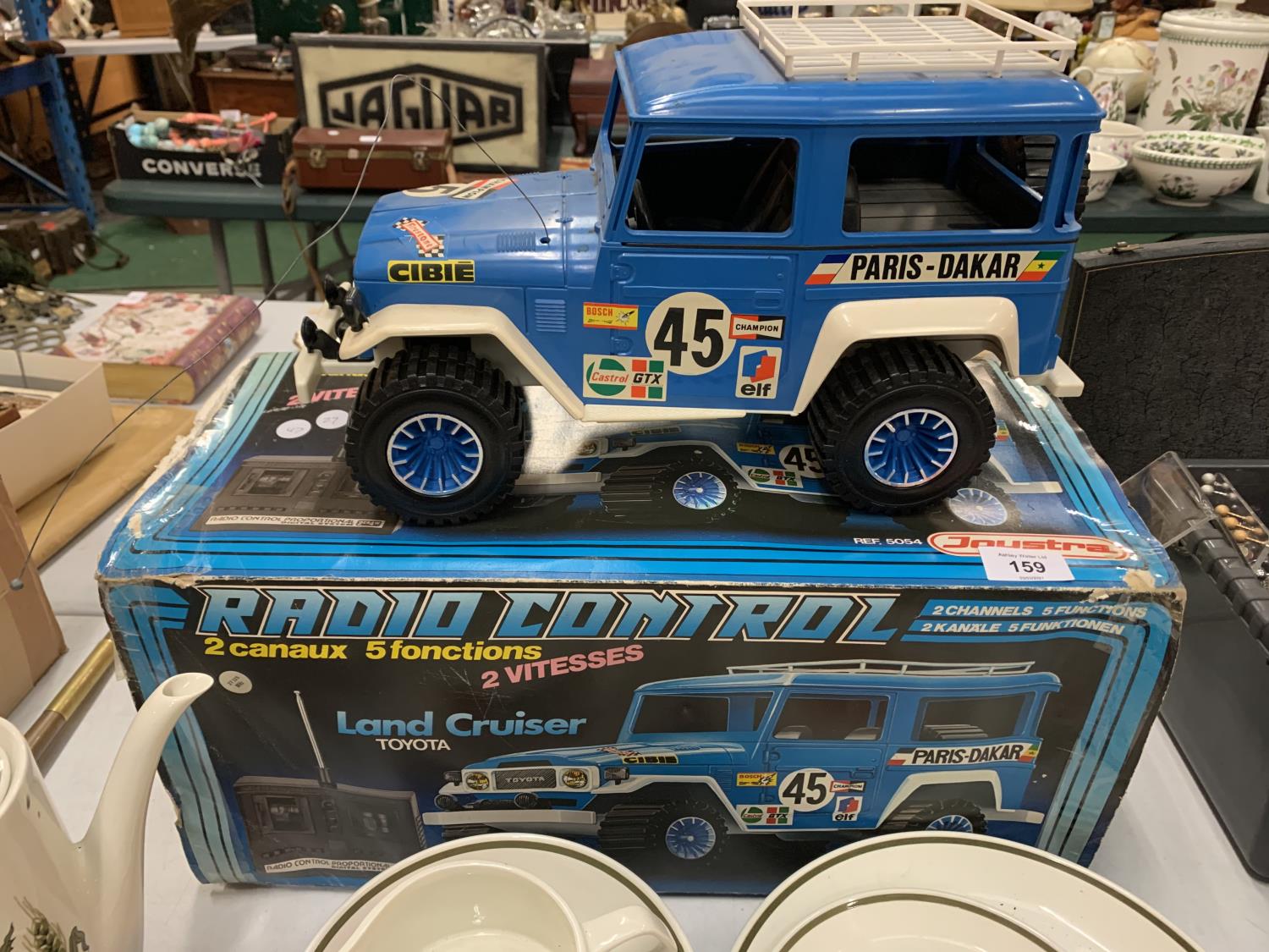 A BOXED RADIO CONTROLLED LAND CRUISER