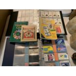 TWO ALBUMS CONTAINING TELEPHONE CARDS, MATCH BOOKS, POSTCARDS ETC AND TWO GUIDE BOOKS
