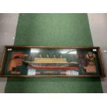 A CASED MODEL OF OF 'THE TITANIC' WALL MOUNTED 106X34CM APPROX