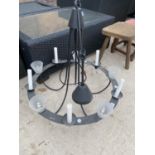 A LARGE METAL CHANDELIER STYLE LIGHT FITTING