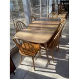 A G-PLAN ELM EXTENDING DINING TABLE AND SIX WINDSOR STYLE CHAIRS, 60x32"