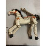 A VINTAGE PAINTED WOODEN STRING PUPPET IN THE FORM OF A HORSE