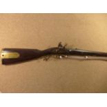 A REPLICA NON FIRING FLINTLOCK BAKER RIFLE