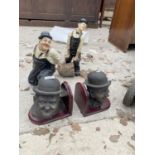 A PAIR OF LAUREL AND HARDY BOOK ENDS AND A FURTHER RESIN EXAMPLE OF LAUREL AND HARDY