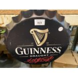 A 'GUINNESS DRAUGHT' TIN METAL SIGN
