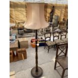 A MID 20TH CENTURY STANDARD LAMP COMPLETE WITH SHADE