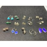 FIFTEEN PAIRS OF SILVER EARRINGS OF VARIOUS DESIGNS