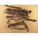 A BROWN LEATHER MILITARY T.2 CARTRIDGE BELT, FURTHER BELTS ETC