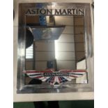 A LARGE CHROME 'ASTON MARTIN' MIRROR - 61CM X 50CM