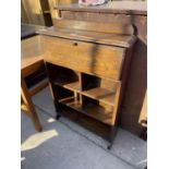 AN EARLY 20TH CENTURY SMALL OAK BUREAU, 26" WIDE