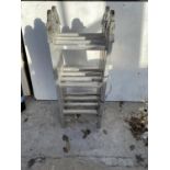 A SET OF FOLDING ALUMINIUM LADDERS