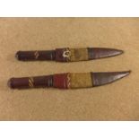 TWO AFRICAN KNIVES 20CM BLADES WITH LEATHER GRIPS AND SCABBARD