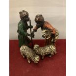 A COLD PAINTED BRONZE GROUP OF TWO ARAB SHEPHERDS WITH LAMBS BY FRANZ BERGMAN - 10CM HIGH