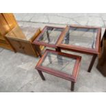 A NEST OF THREE TABLES AND A TWO DOOR CABINET