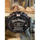 A TIN METAL 'JACK DANIELS' BOTTLE TOP SIGN