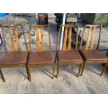 A RETRO G-PLAN STYLE SET OF FOUR DINING CHAIRS