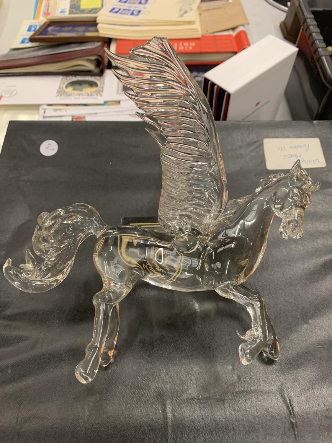 A CRYSTAL GLASS SCULPTURE OF A WINGED HORSE