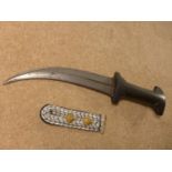 AN ARAB JAMBIYA, 19CM CURVED BLADE AND A MILITARY SHOULDER TAB