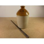 AN SRD RUM FLASK, HEIGHT 33CM AND A SILVER TOPPED BATON (2)