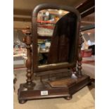 A MAHOGANY DRESSING TABLE MIRROR WITH FINIAL TOPS (FRAME A/F)