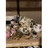 A LARGE QUANTITY OF TEAPOTS AND OTHER CERAMICS