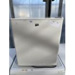 A WHITE FAIRLINE COUNTYER TOP FRIDGE BELIEVED IN WORKING ORDER BUT NO WARRANTY