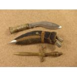 A KUKRI KNIFE, 14CM BLADE, SCABBARD AND A BRASS KNIFE (2)