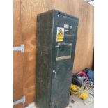 A LARGE VINTAGE METAL STORAGE CUPBOARD