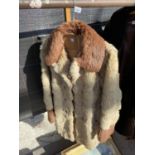 A FAUX FUR LADIES COAT