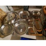 A VARIETY OF STAINLESS STEEL TABLEWARE