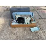 A BROTHER ELECTRIC SEWING MACHINE