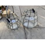 A PAIR OF NEW PARLANE STEEL BRODIE CANDLE LANTERNS ONE LARGE AND ONE SMALL. (LARGE H:30 SMALL H:26)