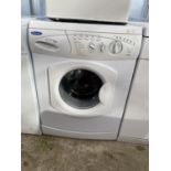 A WHITE HOTPOINT 6KG WASHING MACHINE BELIEVED IN WORKING ORDER BUT NO WARRANTY