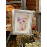 A MODERN SILVER FRAMED WATERCOLOUR FLORAL PRINT