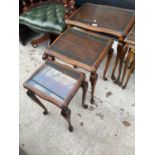 A NEST OF THREE MAHOGANY TABLES