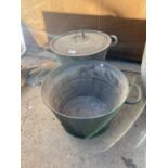 TWO LARGE VINTAGE DOUBLE HANDLED PANS ONE WITH A LID