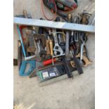 AN ASSORTMENT OF HAND TOOLS TO INCLUDE SAWS, SPANNERS AND HAMMERS ETC